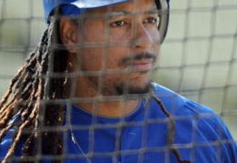 LOS ANGELES, CA - APRIL 30:  Portrait of Manny Ramirez #99 of the Los Angeles Dodgers around the batting cage before the game between the San Francisco Giants at Dodger Stadium on April 30, 2009 in Los Angeles, California.  (Photo by Harry How/Getty Images)
