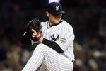 NEW YORK - MAY 05:  Joba Chamberlain #62 of the New York Yankees deals a pitch against the Boston Red Sox on May 5, 2009 at Yankee Stadium in the Bronx borough of New York City. The Red Sox defeated the Yankees 7-3.  (Photo by Jim McIsaac/Getty Images)