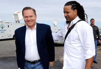 GLENDALE, AZ - MARCH 05:  Manny Ramirez #99 (R) of the Los Angeles Dodgers arrives from Los Angeles with agent Scott Boras on March 5, 2009, at Camelback Ranch in Glendale, Arizona.  Ramirez signed with the Dodgers to a two-year contract with a player option following the first season.  (Photo by Kevork Djansezian/Getty Images)