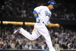 LOS ANGELES, CA - APRIL 30:  Manny Ramirez #99 of the Los Angeles Dodgers hits a homerun for a 4-3 lead against the San Diego Padres during the third inning at Dodger Stadium on April 30, 2009 in Los Angeles, California.  (Photo by Harry How/Getty Images)