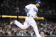 LOS ANGELES, CA - APRIL 30:  Manny Ramirez #99 of the Los Angeles Dodgers hits a homerun for a 4-3 lead against the San Diego Padres during the third inning at Dodger Stadium on April 30, 2009 in Los Angeles, California.  (Photo by Harry How/Getty Images)