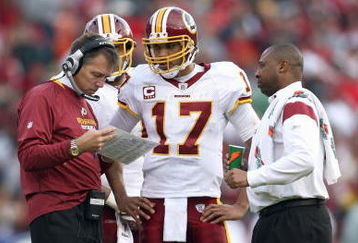 SAN FRANCISCO - DECEMBER 28:  Quarterback Jason Campbell #17 of the Washington Redskins listens to head coach Jim Zorn during the game against of the San Fransisco 49ers at Candlestick Park on December 28, 2008 in San Francisco, California. (Photo by: Jonathan Ferrey/Getty Images)