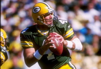 21 Sep 1997: Quarterback Brett Favre #4 of the Green Bay Packers drops back to pass during the Packers 38-32 win over the Minnesota Vikings at Lambeau Field in Green Bay, Wisconsin.