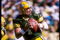 21 Sep 1997: Quarterback Brett Favre #4 of the Green Bay Packers drops back to pass during the Packers 38-32 win over the Minnesota Vikings at Lambeau Field in Green Bay, Wisconsin.