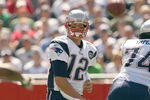 FOXBORO, MA - SEPTEMBER 7:  Quarterback Tom Brady #12 of the New England Patriots passes the ball up the middle during their NFL game against the Kansas City Chiefs on September 7, 2008 at Gillette Stadium in Foxboro, Massachusetts. The Patriots defeated the Chiefs 17-10. (Photo by Elsa Garrison/Getty Images)