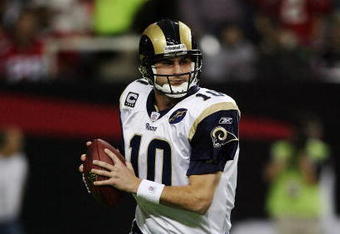 ATLANTA - DECEMBER 28:  Quarterback Marc Bulger #10 of the St. Louis Rams rolls out to pass against the Atlanta Falcons at Georgia Dome on December 28, 2008 in Atlanta, Georgia.  (Photo by Doug Benc/Getty Images)