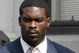 RICHMOND, VA - AUGUST 27: Atlanta Falcons quarterback Michael Vick (R) leaves federal court August 27, 2007 in Richmond, Viriginia. Vick pleaded guilty to a federal dogfighting charge. (Photo by Steve Helber-Pool/Getty Images)