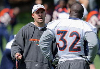 ENGLEWOOD, CO - MAY 03:  Head coach Josh McDaniels of the Denver Broncos chats with running back LaMont Jordan #32 during minicamp at the Broncos training facility on May 3, 2009 in Englewood, Colorado.  (Photo by Doug Pensinger/Getty Images)
