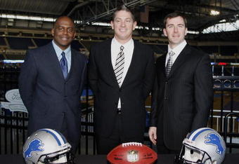 DETROIT , MI - JANUARY 16:  Jim Schwartz, center, head coach of the Detroit Lions poses with General Manager Martin Mayhew, left, and Tom Lewand team president after a press conference to introduce him as the Lions new head coach on January 16, 2009 at Ford Field in Detroit, Michigan.  (Photo by Gregory Shamus/Getty Images)