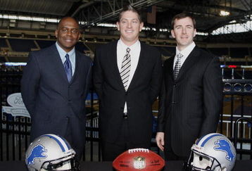 DETROIT , MI - JANUARY 16:  Jim Schwartz, center, head coach of the Detroit Lions poses with General Manager Martin Mayhew, left, and Tom Lewand team president after a press conference to introduce him as the Lions new head coach on January 16, 2009 at Ford Field in Detroit, Michigan.  (Photo by Gregory Shamus/Getty Images)