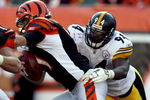 CINCINNATI - OCTOBER 19:  Lawrence Timmons #94 of the Pittsburgh Steelers sacks Ryan Fitzpatrick #11 of the Cincinnati Bengals during the NFL game at Paul Brown Stadium on October 19, 2008 in Cincinnati, Ohio.  (Photo by Andy Lyons/Getty Images)