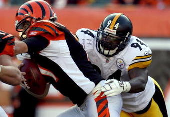 CINCINNATI - OCTOBER 19:  Lawrence Timmons #94 of the Pittsburgh Steelers sacks Ryan Fitzpatrick #11 of the Cincinnati Bengals during the NFL game at Paul Brown Stadium on October 19, 2008 in Cincinnati, Ohio.  (Photo by Andy Lyons/Getty Images)