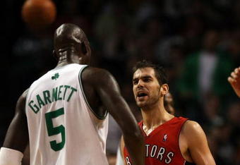 BOSTON - NOVEMBER 10:  Jose Calderon #8 of the Toronto Raptors and Kevin Garnett #5 of the Boston Celtics exchange words on November 10,  2008 at TD Banknorth Garden in Boston, Massachusetts. The Celtics defeated the Toronto Raptors 94-87.  NOTE TO USER: User expressly acknowledges and agrees that, by downloading and/or using this Photograph, user is consenting to the terms and conditions of the Getty Images License Agreement.  (Photo by Elsa/Getty Images)