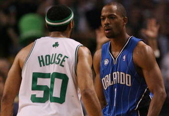 BOSTON - MAY 06:  Rafer Alston #1 of the Orlando Magic and Eddie House #50 of the Boston Celtics exchange words after House scored a three-point shot in the second half in Game Two of the Eastern Conference Semifinals during the 2009 NBA Playoffs at TD Banknorth Garden on May 6, 2009 in Boston, Massachusetts. The Boston Celtics defeated the Orlando Magic 112-94. NOTE TO USER: User expressly acknowledges and agrees that, by downloading and or using this photograph, User is consenting to the terms and conditions of the Getty Images License Agreement.  (Photo by Elsa/Getty Images)