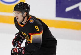 OTTAWA, ON - JANUARY 4:  Jerome Flaake #9 of Team Germany skates during the game against Team Finland at the relegation round of the IIHF World Junior Championships at the Ottawa Civic Centre on January 04, 2009 in Ottawa, Ontario, Canada.  Team Finland defeated Team Germany 3-1.  (Photo by Richard Wolowicz/Getty Images)