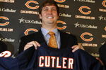 LAKE FOREST, IL - APRIL 3: Quarterback Jay Cutler of the Chicago Bears holds up his #6 jersey after he was introduced as their new quarterback during a press conference on April 3, 2009 at Halas Hall in Lake Forest, Illinois. (Photo by Jim Prisching/Getty Images)