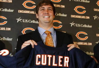 LAKE FOREST, IL - APRIL 3: Quarterback Jay Cutler of the Chicago Bears holds up his #6 jersey after he was introduced as their new quarterback during a press conference on April 3, 2009 at Halas Hall in Lake Forest, Illinois. (Photo by Jim Prisching/Getty Images)