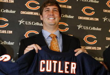 LAKE FOREST, IL - APRIL 3: Quarterback Jay Cutler of the Chicago Bears holds up his #6 jersey after he was introduced as their new quarterback during a press conference on April 3, 2009 at Halas Hall in Lake Forest, Illinois. (Photo by Jim Prisching/Getty Images)