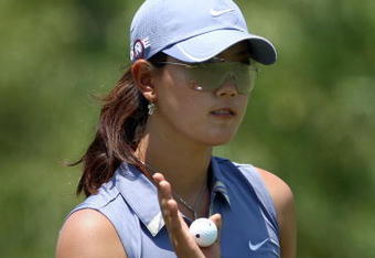 MORELIA, MEXICO- APRIL 25: Michelle Wie waves to the crowd on the 5th hole during the thrid round of the Corona Championship at the Tres Marias Residential Golf Club on April 25, 2009 in Morelia, Michoacan, Mexico. (Photo by Donald Miralle/Getty Images)