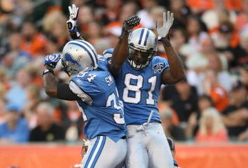CINCINNATI - AUGUST 17:  (L-R) Kevin Smith #34 and Calvin Johnson #81 of the Detroit Lions celebrate during the NFL game against the Cincinnati Bengals at Paul Brown Stadium on August 17, 2008 in Cincinnati, Ohio.  (Photo by Andy Lyons/Getty Images)