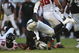 OAKLAND, CA - NOVEMBER 02: JaMarcus Russell #2 of the Oakland Raiders is hit after throwing the ball against the Atlanta Falcons during an NFL game on November 2, 2008 at the Oakland-Alameda County Coliseum in Oakland, California. (Photo by Jed Jacobsohn/Getty Images)