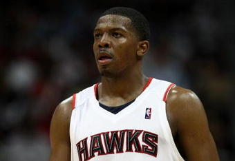 ATLANTA - APRIL 28: Guard Joe Johnson #2 of the Atlanta Hawks takes a breather in Game Four of the Eastern Conference Quarterfinals against the Boston Celtics during the 2008 NBA Playoffs at the Philips Arena on April 28, 2008 in Atlanta, Georgia. The Hawks beat the Celtics 97-92.  NOTE TO USER: User expressly acknowledges and agrees that, by downloading and or using this photograph, User is consenting to the terms and conditions of the Getty Images License Agreement. (Photo by Mike Zarrilli/Getty Images)
