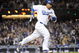 LOS ANGELES, CA - APRIL 30:  Manny Ramirez #99 of the Los Angeles Dodgers hits a homerun for a 4-3 lead against the San Diego Padres during the third inning at Dodger Stadium on April 30, 2009 in Los Angeles, California.  (Photo by Harry How/Getty Images)