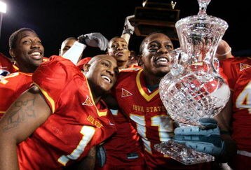 NEW ORLEANS - DECEMBER 28:  Tyson Smith #1 and Luke Clemens #11 of Iowa State celebrate their win over Miami of Ohio during the Independence bowl at Independence Stadium on December 28, 2004 in Shreveport, Louisiana. Iowa defeated Miami of Ohio 17-13.  (Photo by Chris Graythen/Getty Images) 