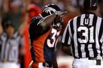 6 Oct 1997:  Running back Terrell Davis of the Denver Broncos performs the 'Mile High Salute' after scoring a touchdown during a game against the New England Patriots at Mile High Stadium in Denver, Colorado.  The Broncos won the game, 34-13. Mandatory Credit: Todd Warshaw  /Allsport