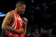 LOS ANGELES, CA - MAY 06:  Ron Artest #96 of the Houston Rockets looks over at a fan in the second quarter against the Los Angeles Lakers in Game Two of the Western Conference Semifinals during the 2009 NBA Playoffs at Staples Center on May 6, 2009 in Los Angeles, California. NOTE TO USER: User expressly acknowledges and agrees that, by downloading and or using this photograph, User is consenting to the terms and conditions of the Getty Images License Agreement.  (Photo by Harry How/Getty Images)