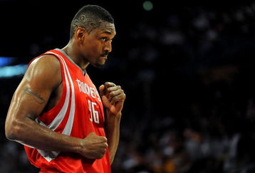 LOS ANGELES, CA - MAY 06:  Ron Artest #96 of the Houston Rockets looks over at a fan in the second quarter against the Los Angeles Lakers in Game Two of the Western Conference Semifinals during the 2009 NBA Playoffs at Staples Center on May 6, 2009 in Los Angeles, California. NOTE TO USER: User expressly acknowledges and agrees that, by downloading and or using this photograph, User is consenting to the terms and conditions of the Getty Images License Agreement.  (Photo by Harry How/Getty Images)