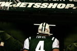 EAST RUTHERFORD, NJ - DECEMBER 28: Brett Favre #4 of The New York Jets leaves the field after losing to The Miami Dolphins 24-17 after their game on December 28, 2008 at Giants Stadium in East Rutherford, New Jersey. (Photo by Al Bello/Getty Images)