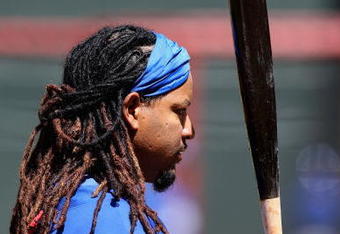 PHOENIX - APRIL 12:  Manny Ramirez #99 of the Los Angeles Dodgers warms up during batting practice before the game against the Arizona Diamondbacks at Chase Field on April 12, 2009 in Phoenix, Arizona.  (Photo by Christian Petersen/Getty Images)