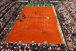 PARIS - JUNE 08:  A general view of Court Philippe Chatrier as Rafael Nadal of Spain celebrates winning matchpoint during the Men's Singles Final match against Roger Federer of Switzerland on day fifteen of the French Open at Roland Garros on June 8, 2008 in Paris, France.  (Photo by Mike Hewitt/Getty Images)