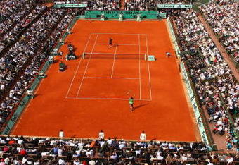 PARIS - JUNE 08:  A general view of Court Philippe Chatrier as Rafael Nadal of Spain celebrates winning matchpoint during the Men's Singles Final match against Roger Federer of Switzerland on day fifteen of the French Open at Roland Garros on June 8, 2008 in Paris, France.  (Photo by Mike Hewitt/Getty Images)