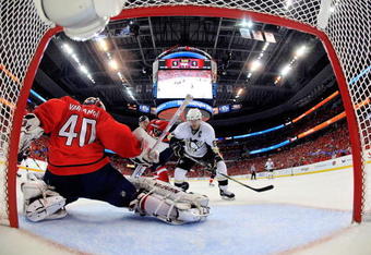WASHINGTON - MAY 04:  Sindey Crosby #87 of the Pittsburgh Penguins scores a second period goal against Simeon Varlamov #40 of the Washington Capitals during Game Two of the Eastern Conference Semifinal Round of the 2009 Stanley Cup Playoffs on May 4, 2009 at the Verizon Center in Washington,  DC.  (Photo by Len Redkoles/Getty Images)