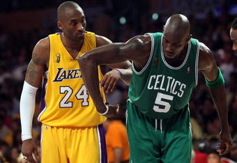 LOS ANGELES, CA - JUNE 12:  Kobe Bryant #24 of the Los Angeles Lakers gets tangled up with Kevin Garnett #5 of the Boston Celtics in Game Four of the 2008 NBA Finals on June 12, 2008 at Staples Center in Los Angeles, California.  NOTE TO USER: User expressly acknowledges and agrees that, by downloading and/or using this Photograph, user is consenting to the terms and conditions of the Getty Images License Agreement.  (Photo by Stephen Dunn/Getty Images)
