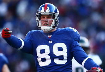 EAST RUTHERFORD, NJ -  JANUARY 11:  Kevin Boss #89 of the New York Giants gestures against the Philadelphia Eagles during the NFC Divisional Playoff Game on January 11, 2009 at Giants Stadium in East Rutherford, New Jersey.  The Eagles defeated the Giants 23 -11. (Photo by Chris McGrath/Getty Images)