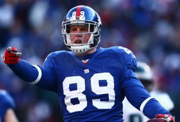 EAST RUTHERFORD, NJ -  JANUARY 11:  Kevin Boss #89 of the New York Giants gestures against the Philadelphia Eagles during the NFC Divisional Playoff Game on January 11, 2009 at Giants Stadium in East Rutherford, New Jersey.  The Eagles defeated the Giants 23 -11. (Photo by Chris McGrath/Getty Images)