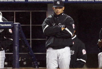 NEW YORK - MAY 04:  Manager Joe Girardi of the New York Yankees looks on against the Boston Red Sox on May 4, 2009 at Yankee Stadium in the Bronx borough of New York City. The Red Sox defeated the Yankees 6-4  (Photo by Jim McIsaac/Getty Images)