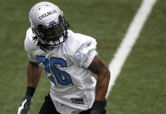 ALLEN PARK, MI - MAY 01:  Louis Delmas #26 of the Detroit Lions looks for a pass during rookie orientation camp at the Detroit Lions Headquarters and Training Facility on May 1, 2009 in Allen Park, Michigan.  (Photo by Gregory Shamus/Getty Images)