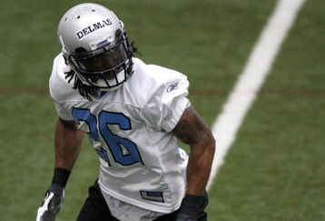 ALLEN PARK, MI - MAY 01:  Louis Delmas #26 of the Detroit Lions looks for a pass during rookie orientation camp at the Detroit Lions Headquarters and Training Facility on May 1, 2009 in Allen Park, Michigan.  (Photo by Gregory Shamus/Getty Images)
