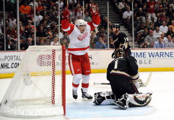 ANAHEIM, CA - MAY 07:  Valterri Filppula #51 of the Detroit Red Wings celebrates as a goal by Marian Hossa #81 of the Red Wings gets by goalie Jonas Hiller #1 of the Anaheim Ducks in the second period of Game Four of the Western Conference Semifinals at Honda Center on May 7, 2009 in Anaheim, California.  (Photo by Harry How/Getty Images)