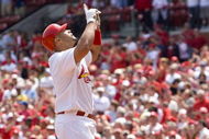 ST. LOUIS, MO - APRIL 23: Albert Pujols #5 of the St. Louis Cardinals celebrates his first home run of the game against the New York Mets on April 23, 2009 at Busch Stadium in St. Louis, Missouri. The Cardinals beat the Mets 12-8.  (Photo by Dilip Vishwanat/Getty Images)