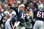 FOXBORO, MA - JANUARY 20:  Tom Brady #12 of the New England Patriots throws a pass against the San Diego Chargers during the AFC Championship Game on January 20, 2008 at Gillette Stadium in Foxboro, Massachusetts.  (Photo by Al Bello/Getty Images)