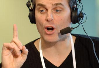 Colin Cowherd of ESPN Radio hosts The Herd from the Super Bowl XL Media Center at the Renaissance Center in Detroit, Michigan on January 30, 2006.  (Photo by Al Messerschmidt/Getty Images)