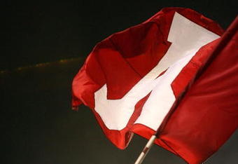 TUSCALOOSA, AL - NOVEMBER 29:  Defensive lineman Bobby Greenwood #93 of the Alabama Crimson Tide waves an Alabama flag after defeating the Auburn Tigers at Bryant-Denny Stadium on November 29, 2008 in Tuscaloosa, Alabama. Alabama defeated Auburn 36-0.  (Photo by Doug Benc/Getty Images)