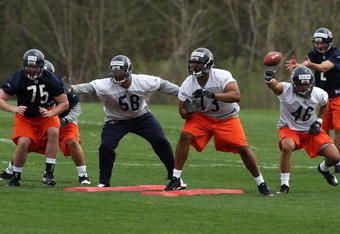 LAKE FOREST, IL - MAY 01: (L-R) Dave Peck #75, Marcus Freeman #58, Jarron Gilbert#73 and Al Afalava #46 of the Chicago Bears participate in a special teams drill during a rookie mini-camp practice on May 1, 2009 at Halas Hall in Lake Forest, Illinois. (Photo by Jonathan Daniel/Getty Images)