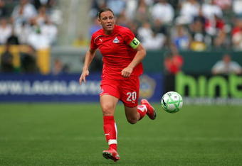 CARSON, CA - MARCH 29:  Abby Wambach #20 of the Washington Freedom paces the ball on the right wing during their inaugural WPS match against the Los Angeles Sol at The Home Depot Center on March 29, 2009 in Carson, California. The Sol defeated the Freedom 2-0.  (Photo by Victor Decolongon/Getty Images)