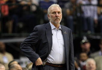 DALLAS - APRIL 25:  Head coach Gregg Popovich of the San Antonio Spurs during play against the Dallas Mavericks in Game Four of the Western Conference Quarterfinals during the 2009 NBA Playoffs at American Airlines Center on April 25, 2009 in Dallas, Texas. NOTE TO USER: User expressly acknowledges and agrees that, by downloading and or using this photograph, User is consenting to the terms and conditions of the Getty Images License Agreement.  (Photo by Ronald Martinez/Getty Images)